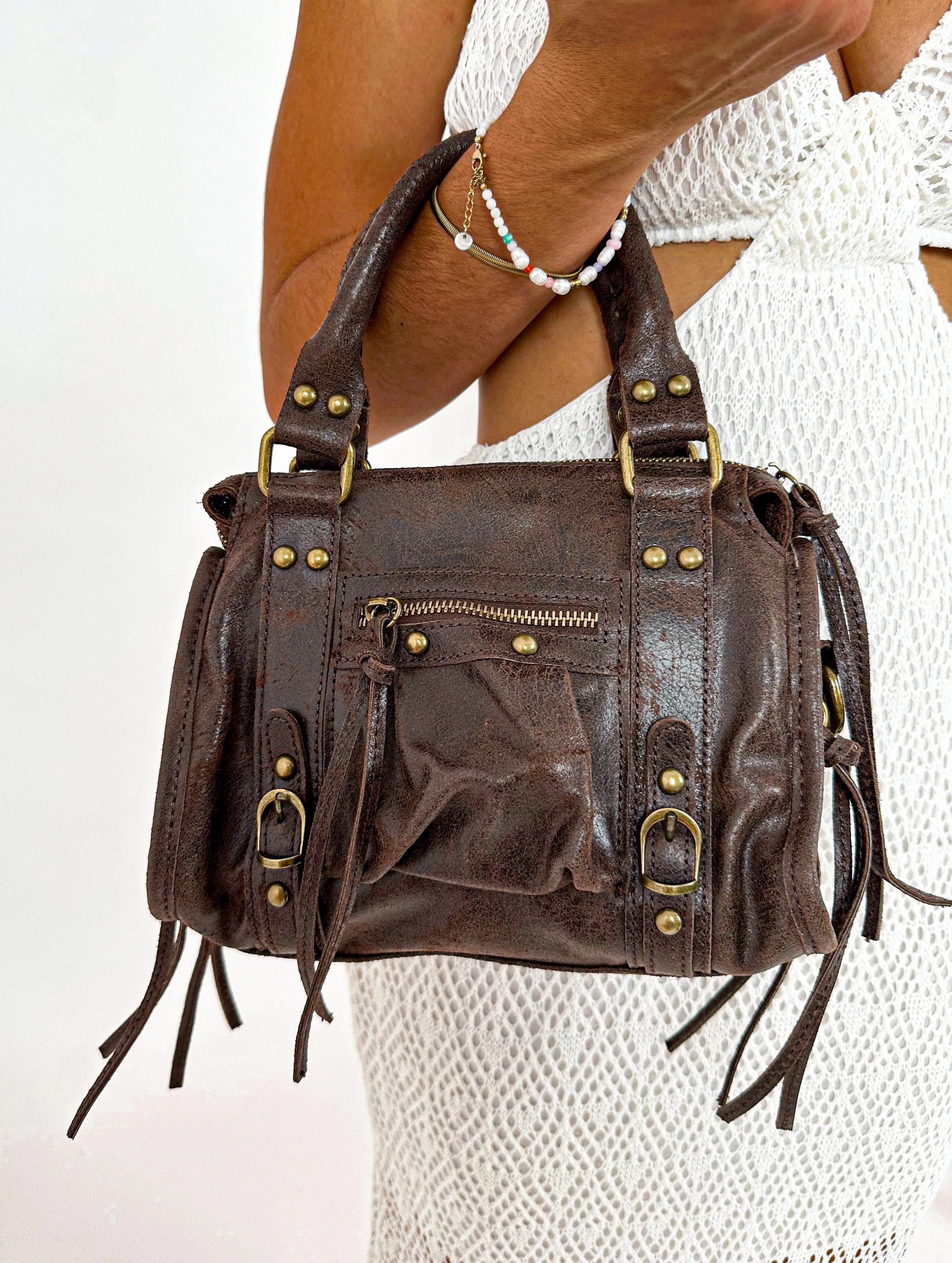 Bolso hebillas piel brillos chocolate sold by Sorellas