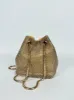 Clutch saco fiesta dorado sold by Sorellas