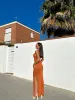 Vestido halter punto naranja sold by Sorellas