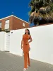 Vestido halter punto naranja sold by Sorellas