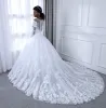 Sheer Neck Long Sleeves Tulle Ball Gown Wedding Dresses with Beading Appliques sold by Lavetir