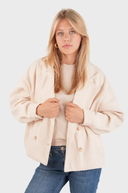 "Scandi" coat beige sold by Meet Me There