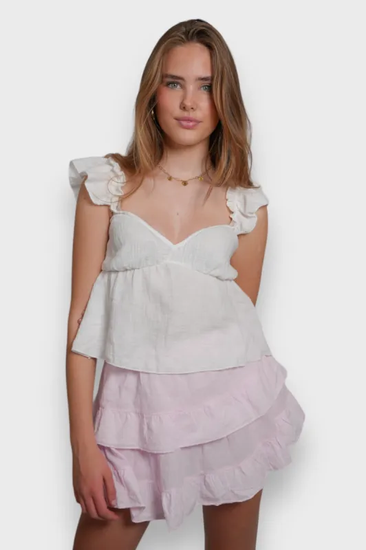 "Joy" skort light pink sold by Meet Me There