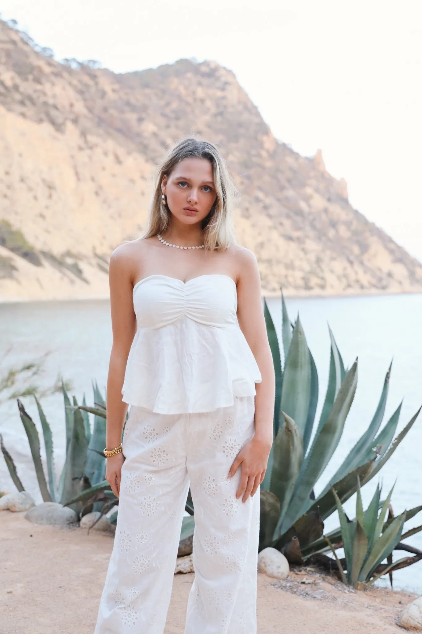 "Breeze" top white sold by Meet Me There