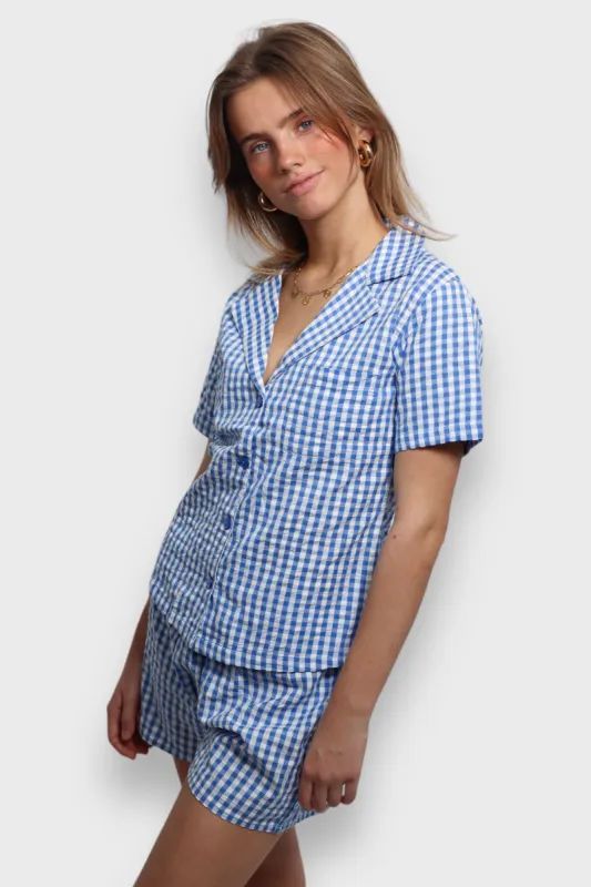 "Check" pyjama blue sold by Meet Me There