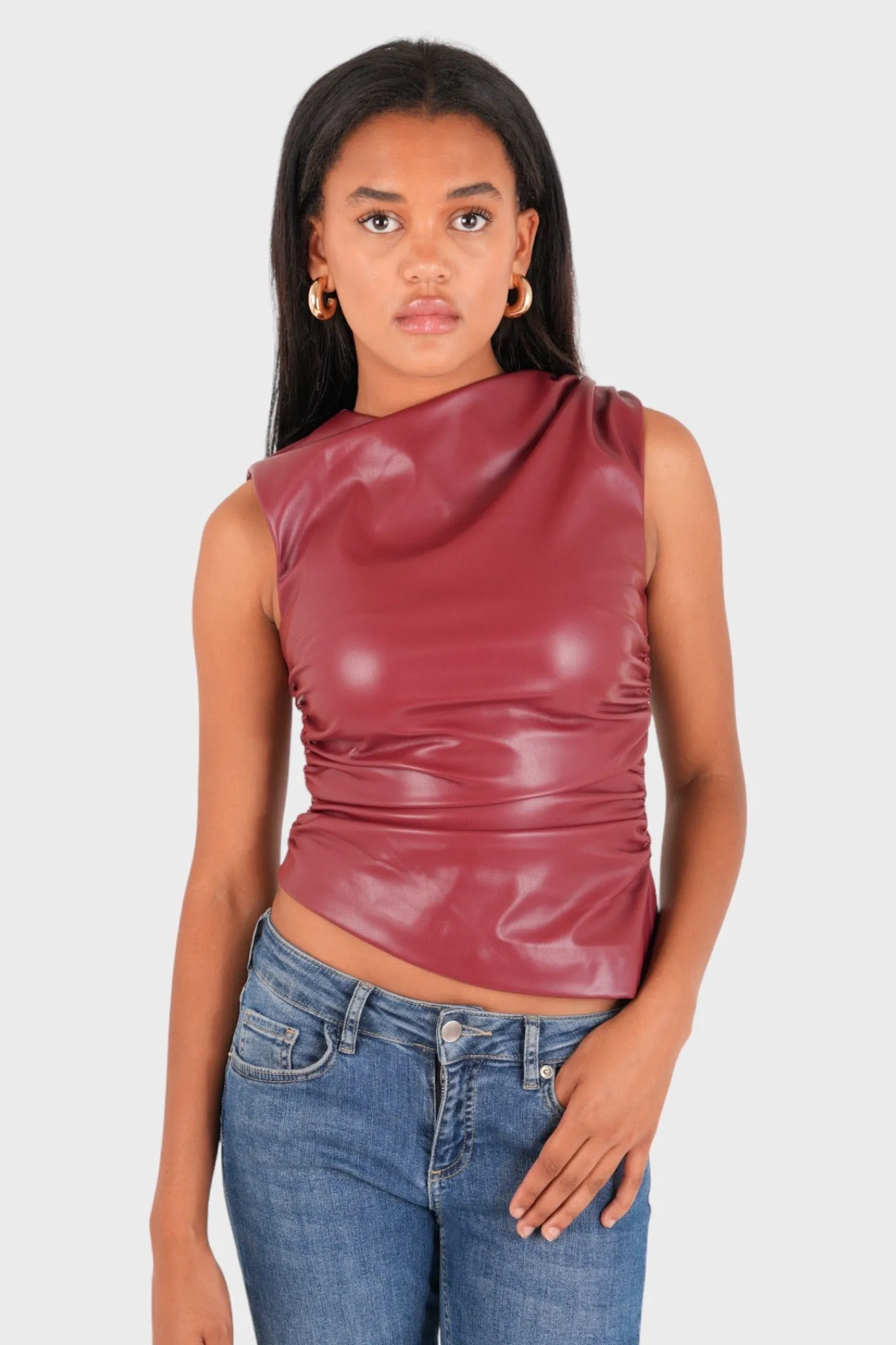 "Classy" leather top red sold by Meet Me There
