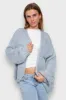 "Keep me warm" vest light blue sold by Meet Me There