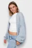 "Keep me warm" vest light blue sold by Meet Me There