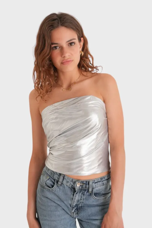 "Glow" top silver sold by Meet Me There