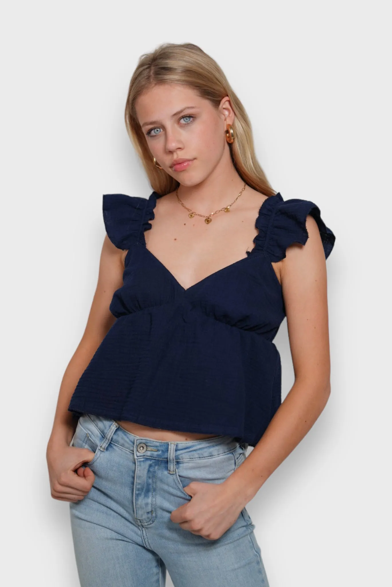 "Sandy" top navy sold by Meet Me There