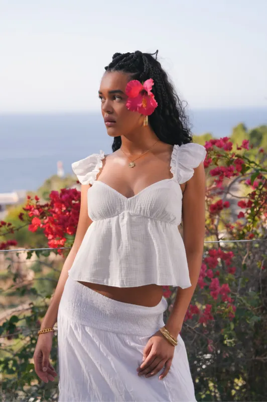 "Sandy" top white sold by Meet Me There