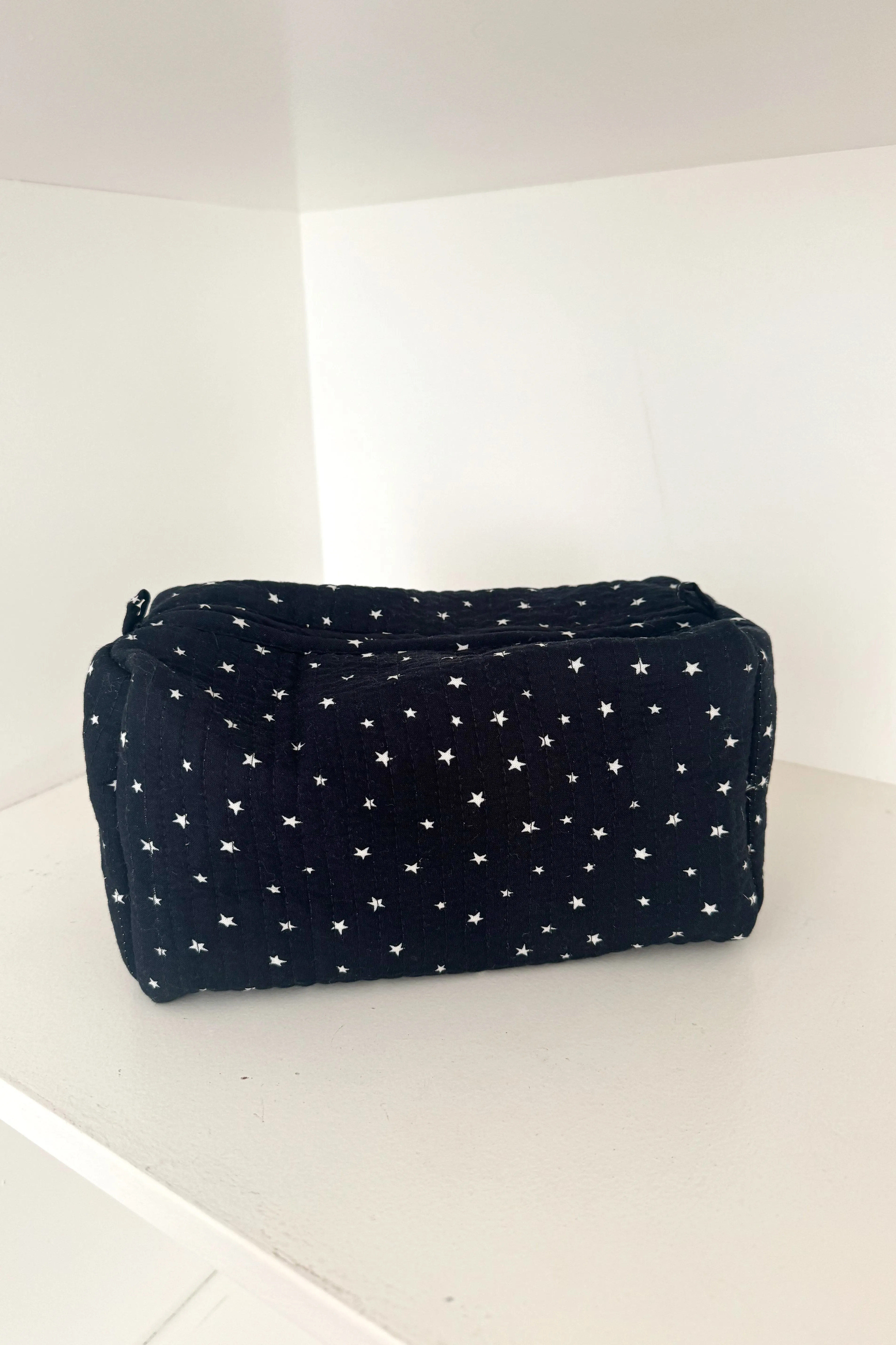 "Starry" pouch sold by Meet Me There