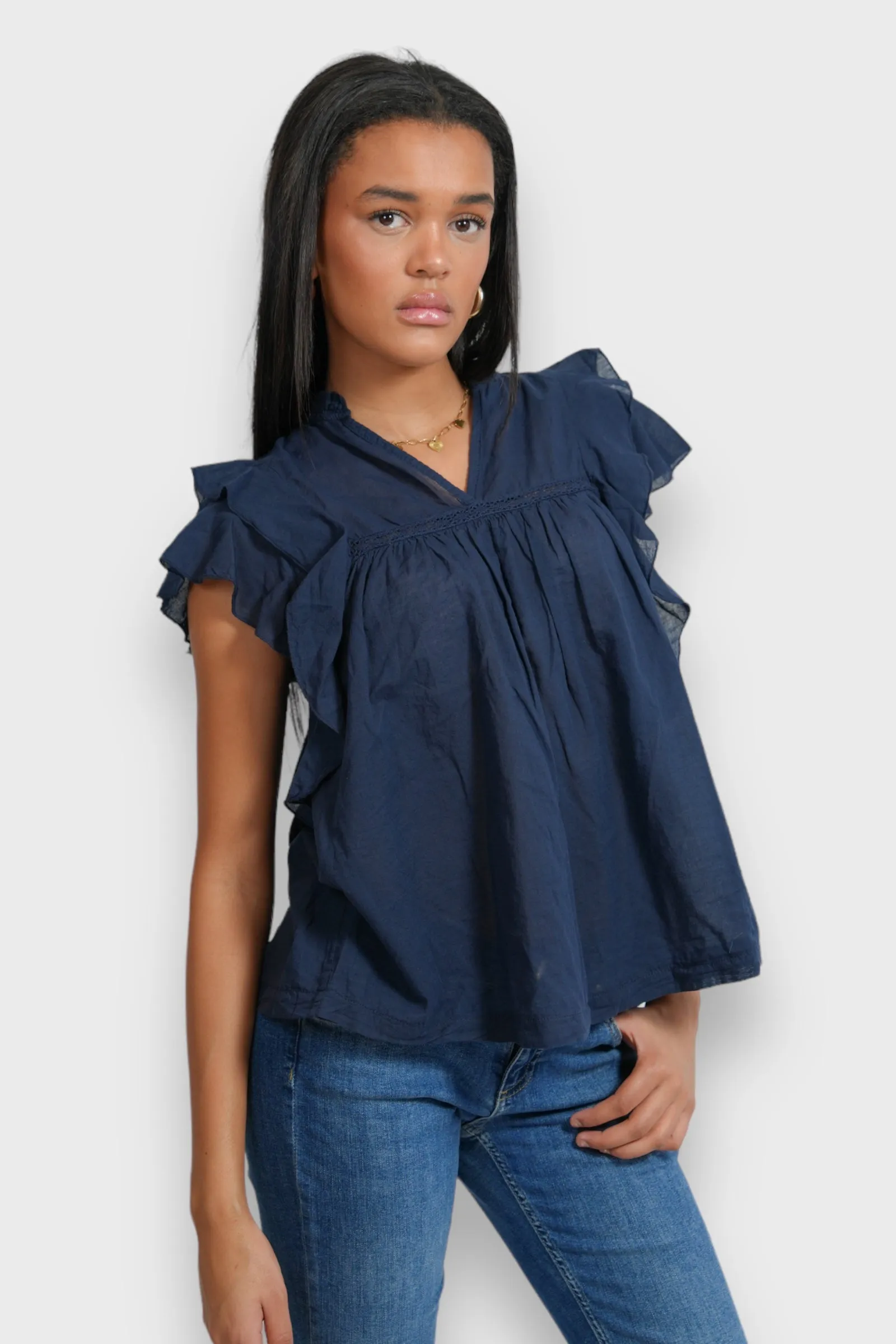 "Flora" blouse navy sold by Meet Me There