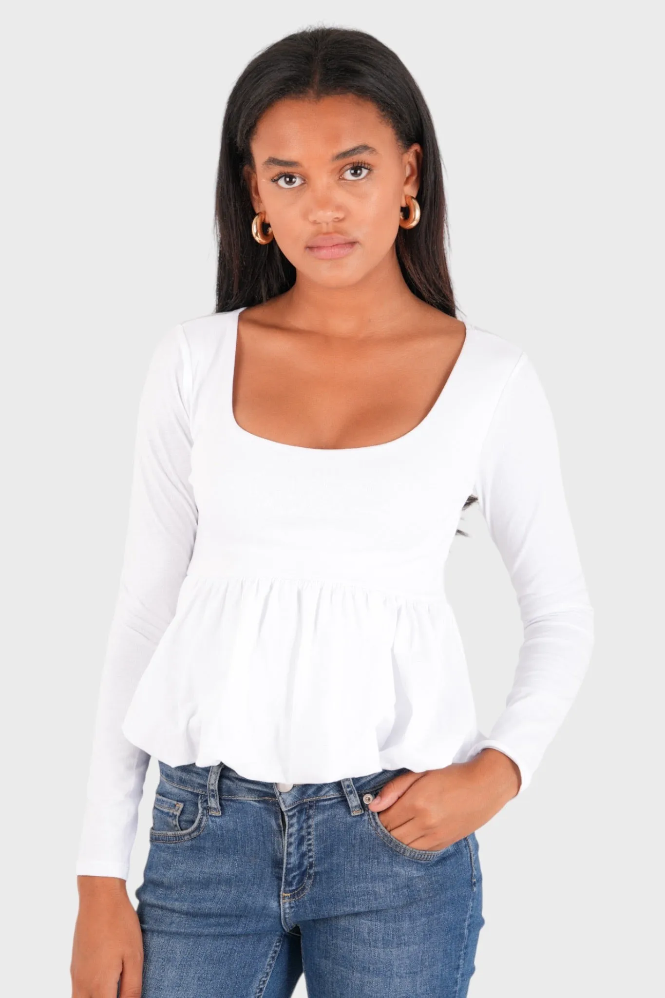"Peplum" top white sold by Meet Me There