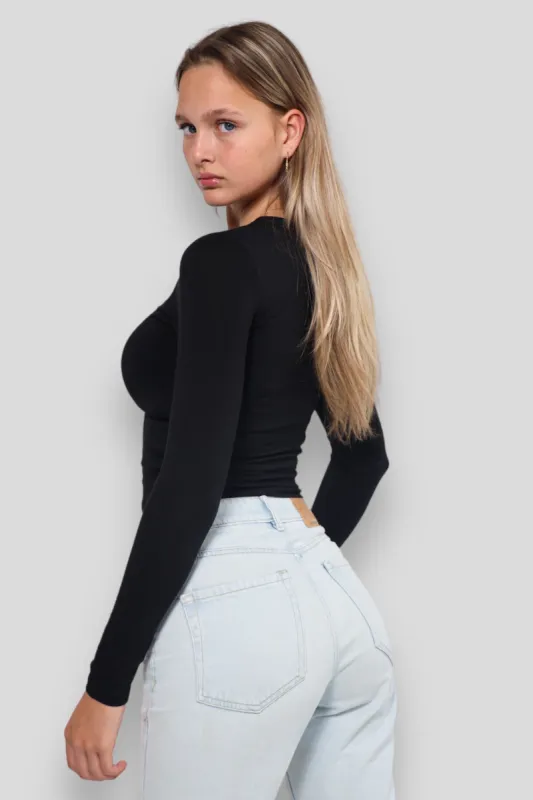 "Muse" top black sold by Meet Me There