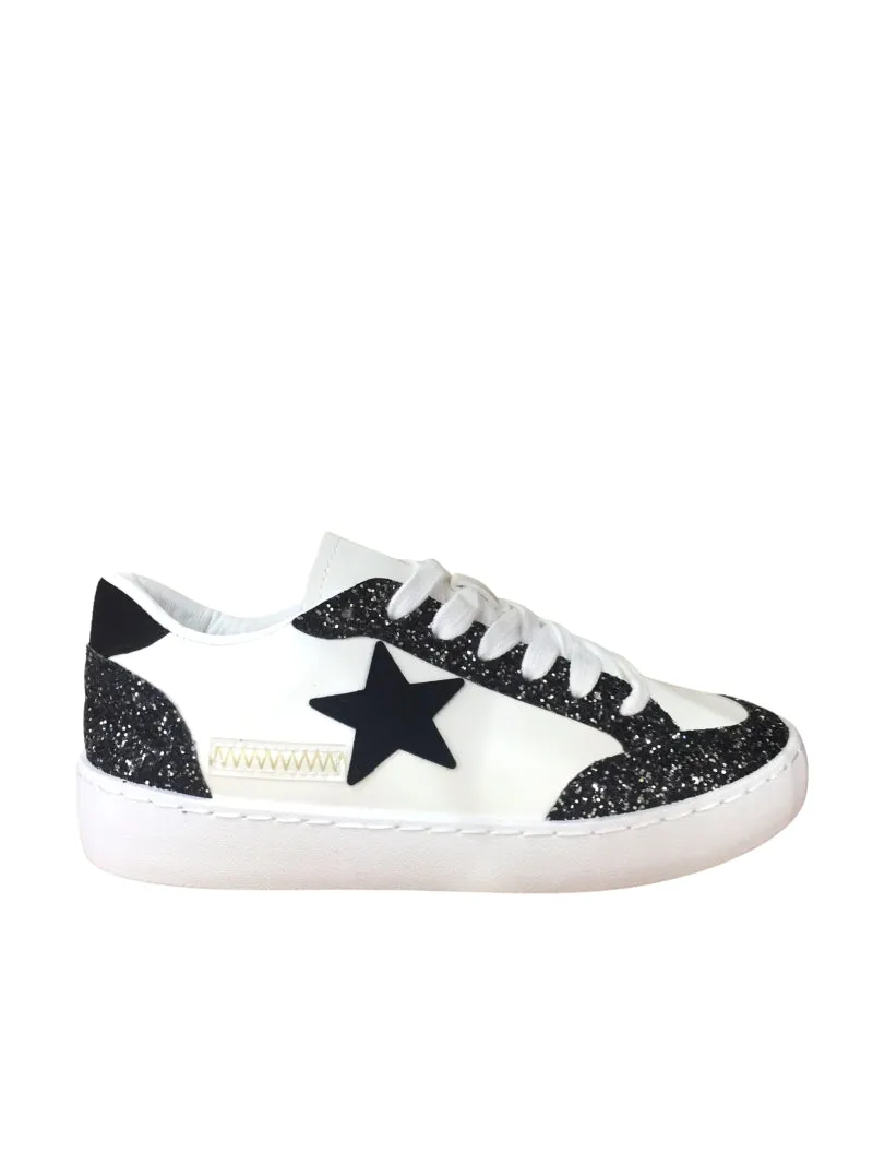 "Glitter star" shoes black sold by Meet Me There