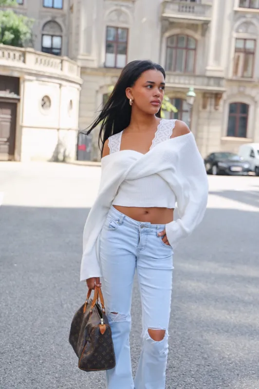 “Lace" sweater white sold by Meet Me There
