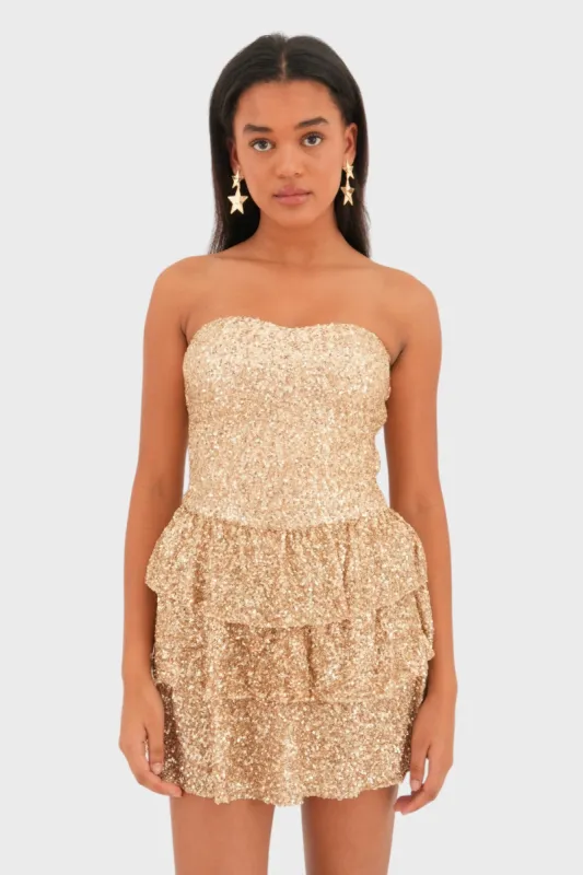 “Nightfall" dress gold sold by Meet Me There
