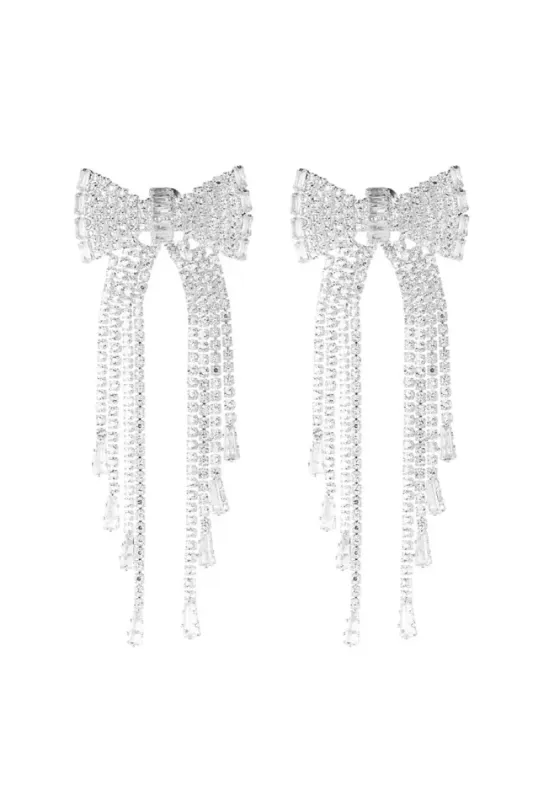 "Shiny bow" earrings silver sold by Meet Me There