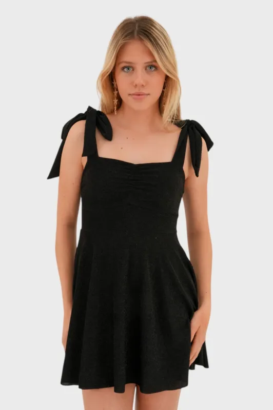 "Twinkle" dress black sold by Meet Me There
