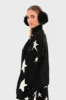 "Starlit" sweater black sold by Meet Me There