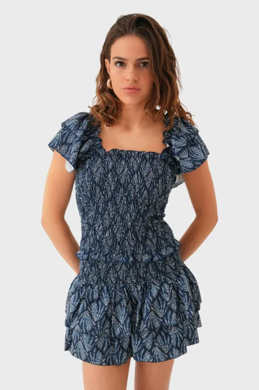 "Mykonos" ruffle top navy sold by Meet Me There