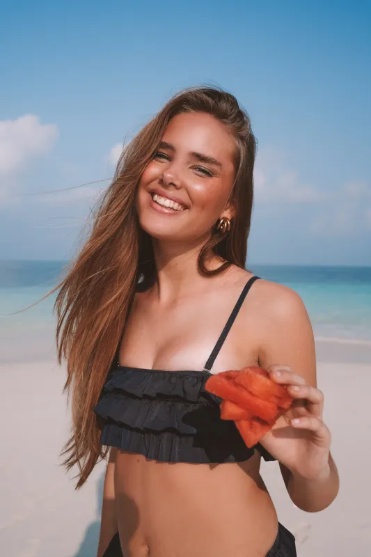 "Ruffle" bikini top navy sold by Meet Me There