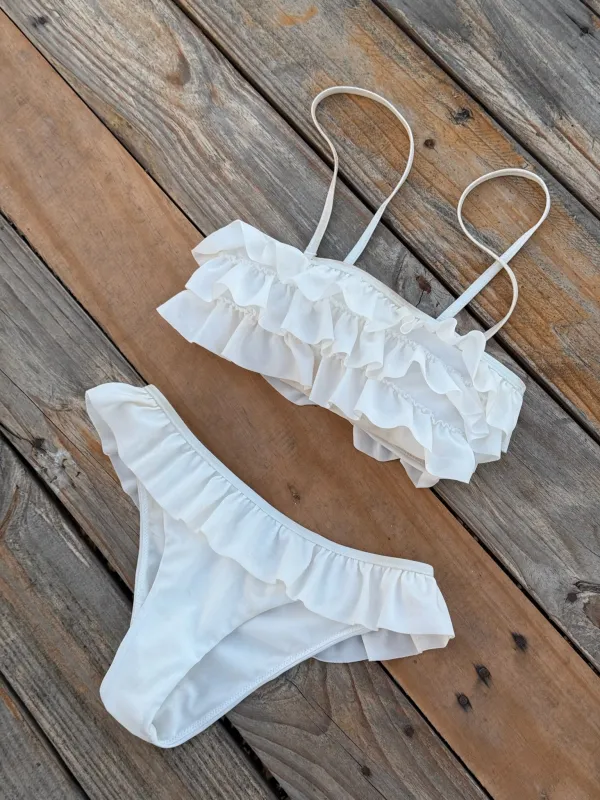 "Ruffle" bikini top white sold by Meet Me There