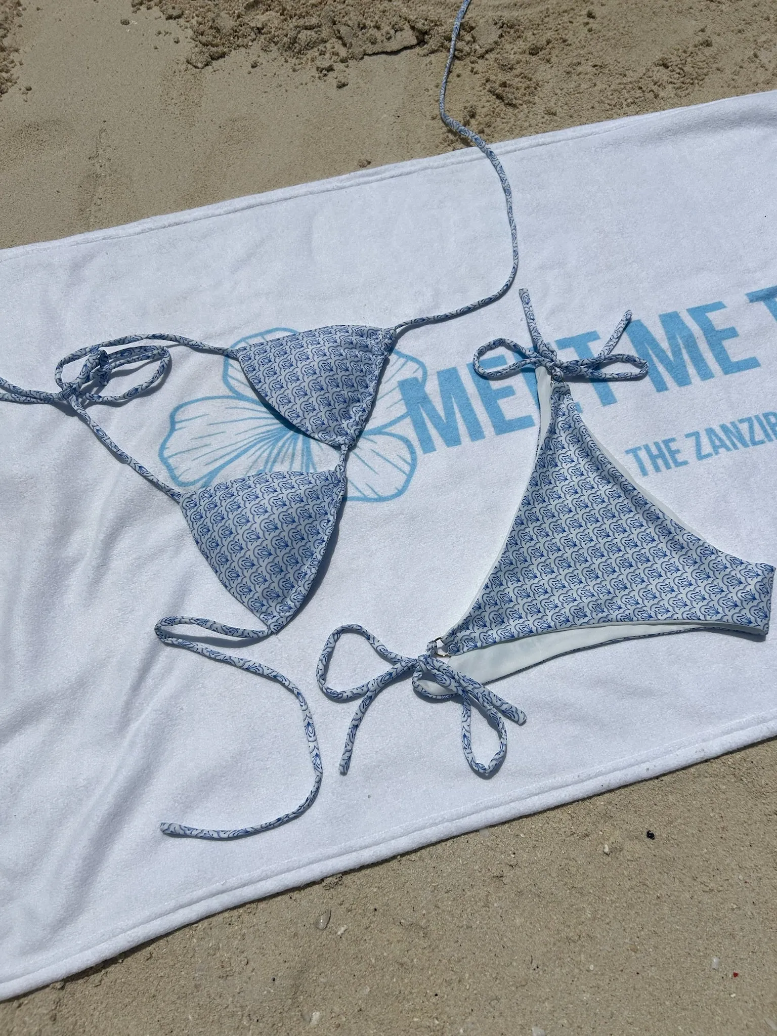 "Amalfi" tied bikini bottom blue sold by Meet Me There