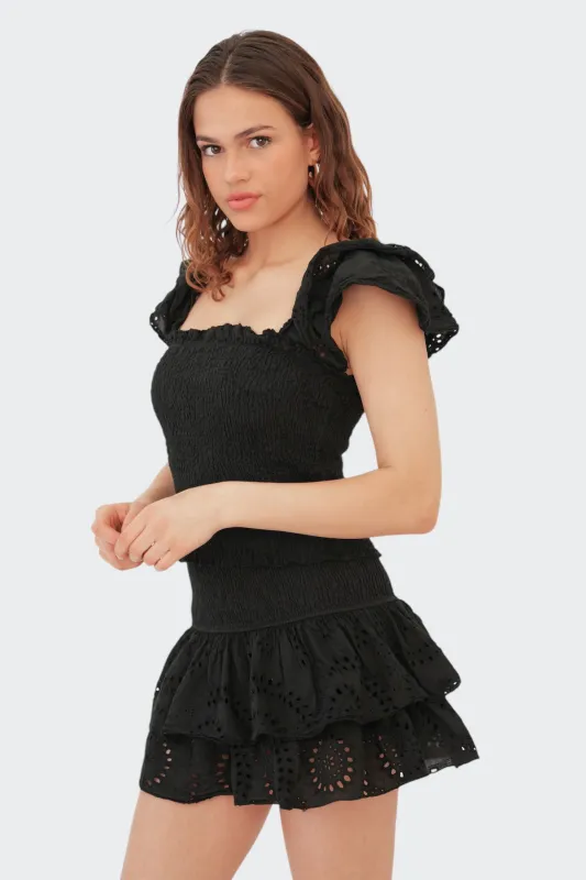 "Daydream" ruffle top black sold by Meet Me There