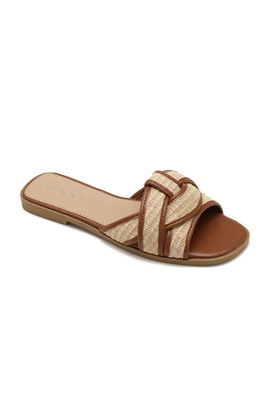 "Beachy" slippers sold by Meet Me There