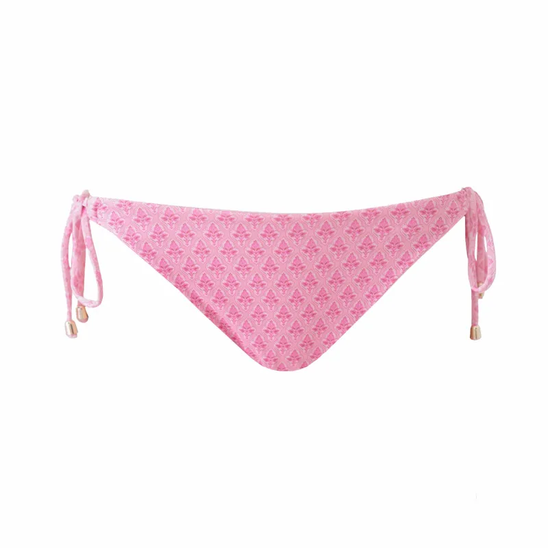 "Tropical" tied bikini bottom pink sold by Meet Me There