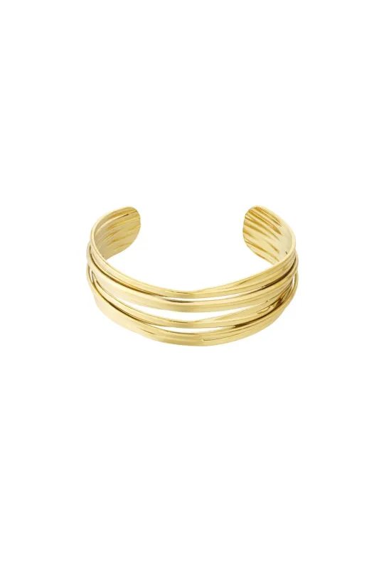 "Wavy" bangle bracelet sold by Meet Me There