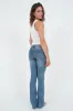 "Ripped" flared jeans dark blue sold by Meet Me There