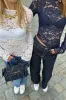 "Ivy" top navy sold by Meet Me There