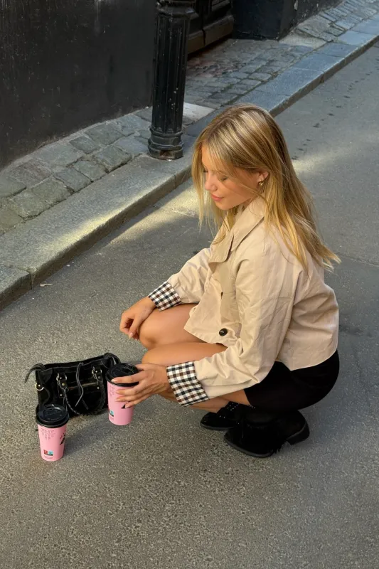 "Checked" trenchcoat beige sold by Meet Me There