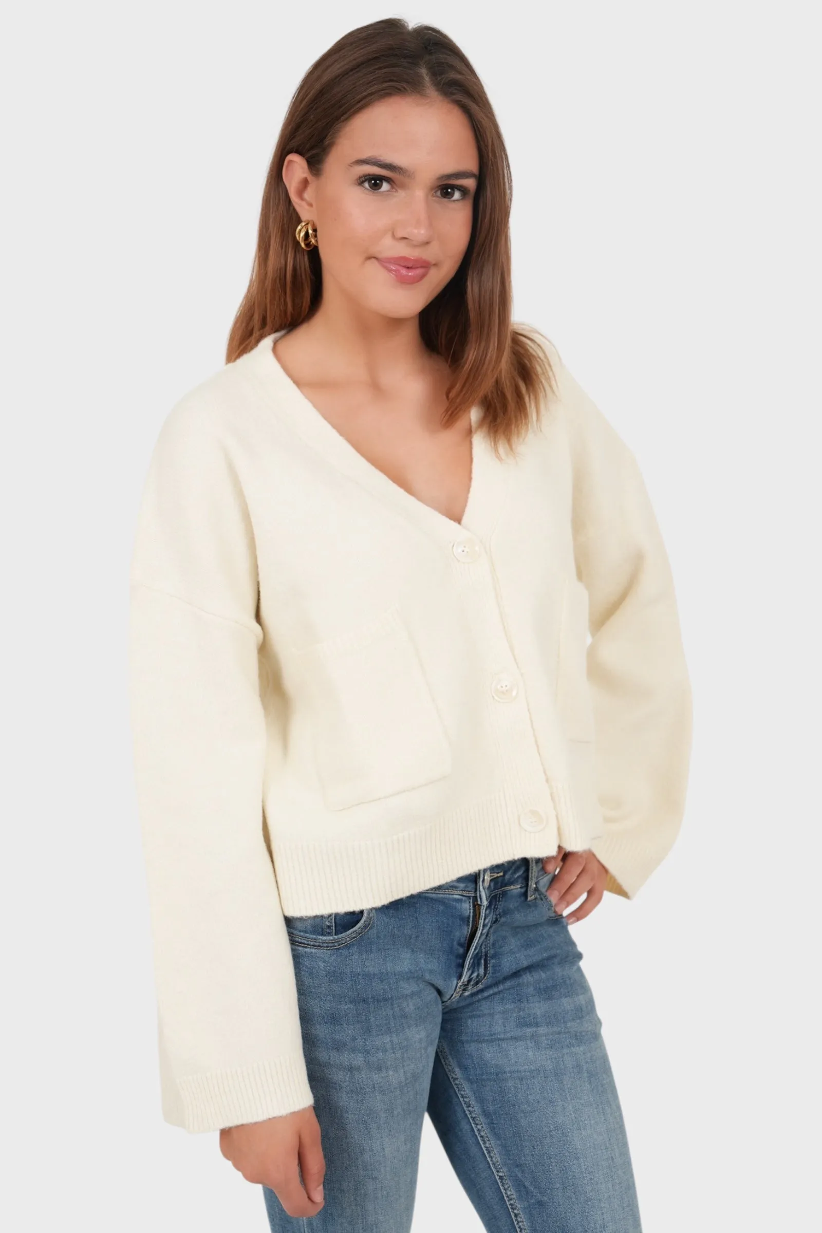 "Aurora" cardigan beige sold by Meet Me There