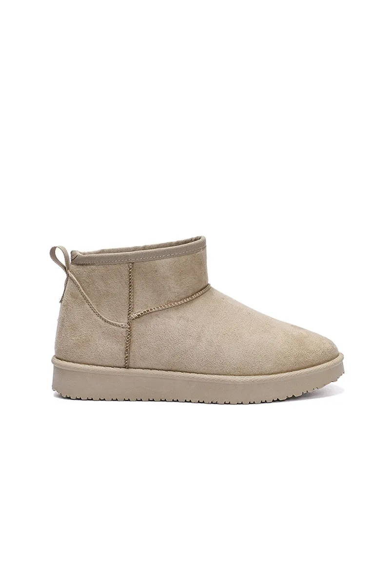 "Cozy" boots beige sold by Meet Me There