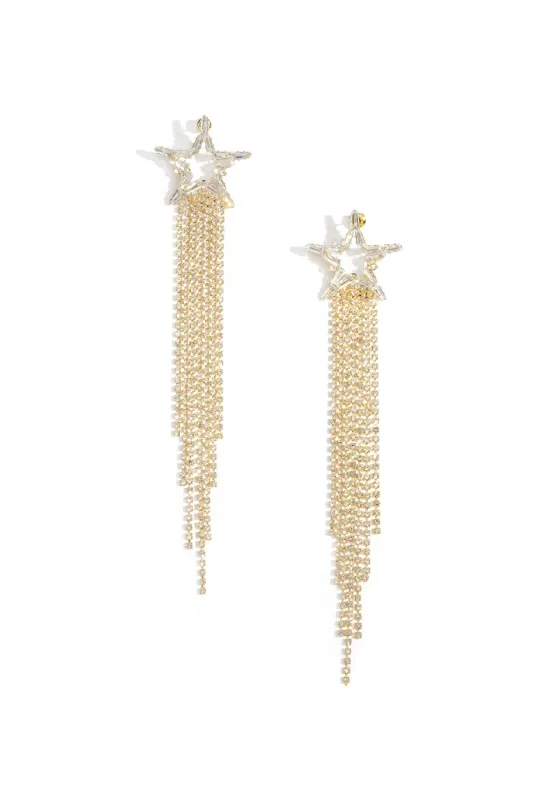 "Falling star" earrings gold sold by Meet Me There