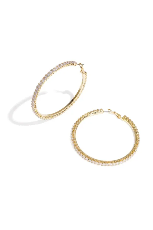 "Sparkly" hoop earrings sold by Meet Me There