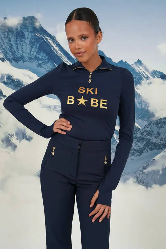 "Ski babe" ski pully navy sold by Meet Me There