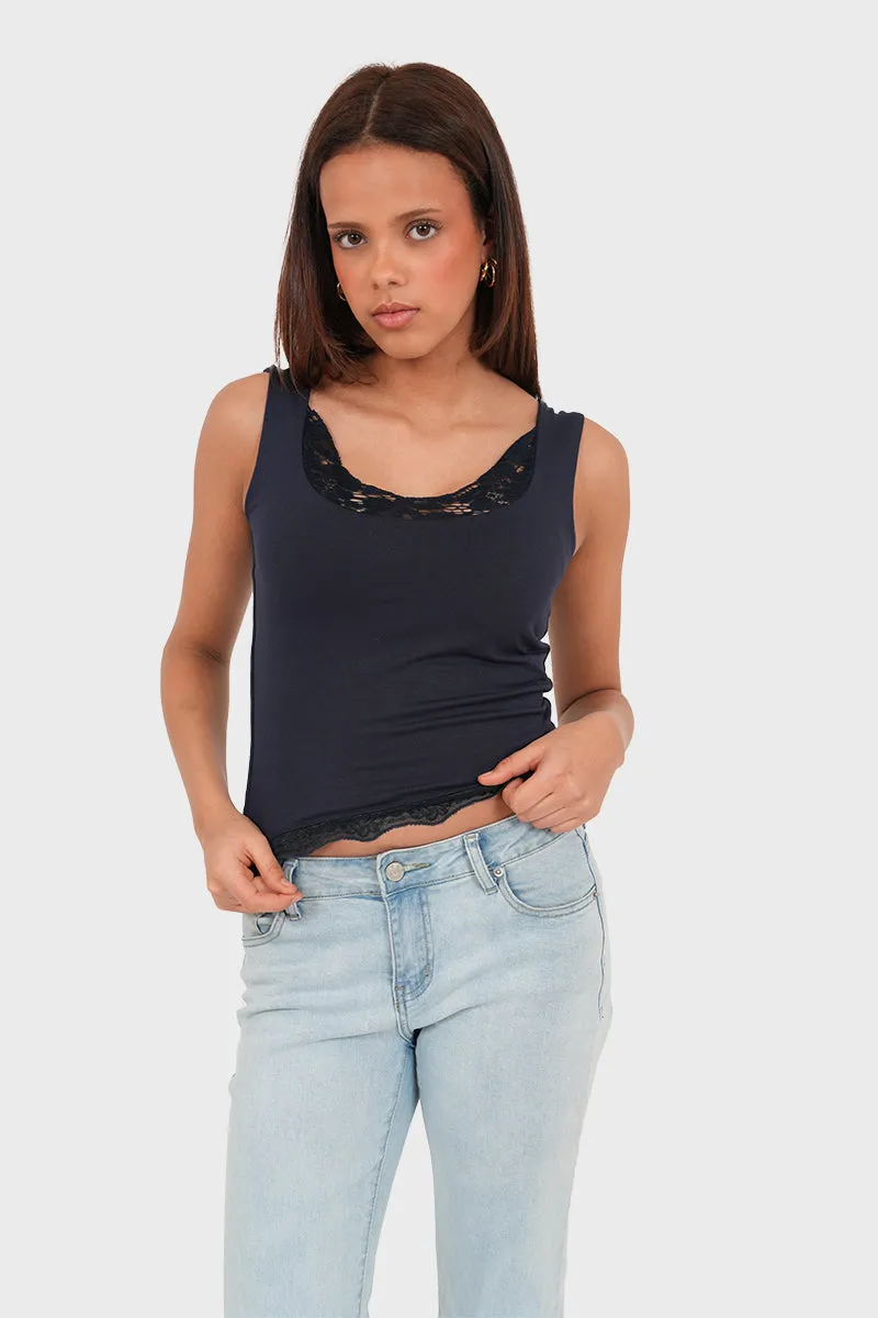 "Anna" top navy sold by Meet Me There