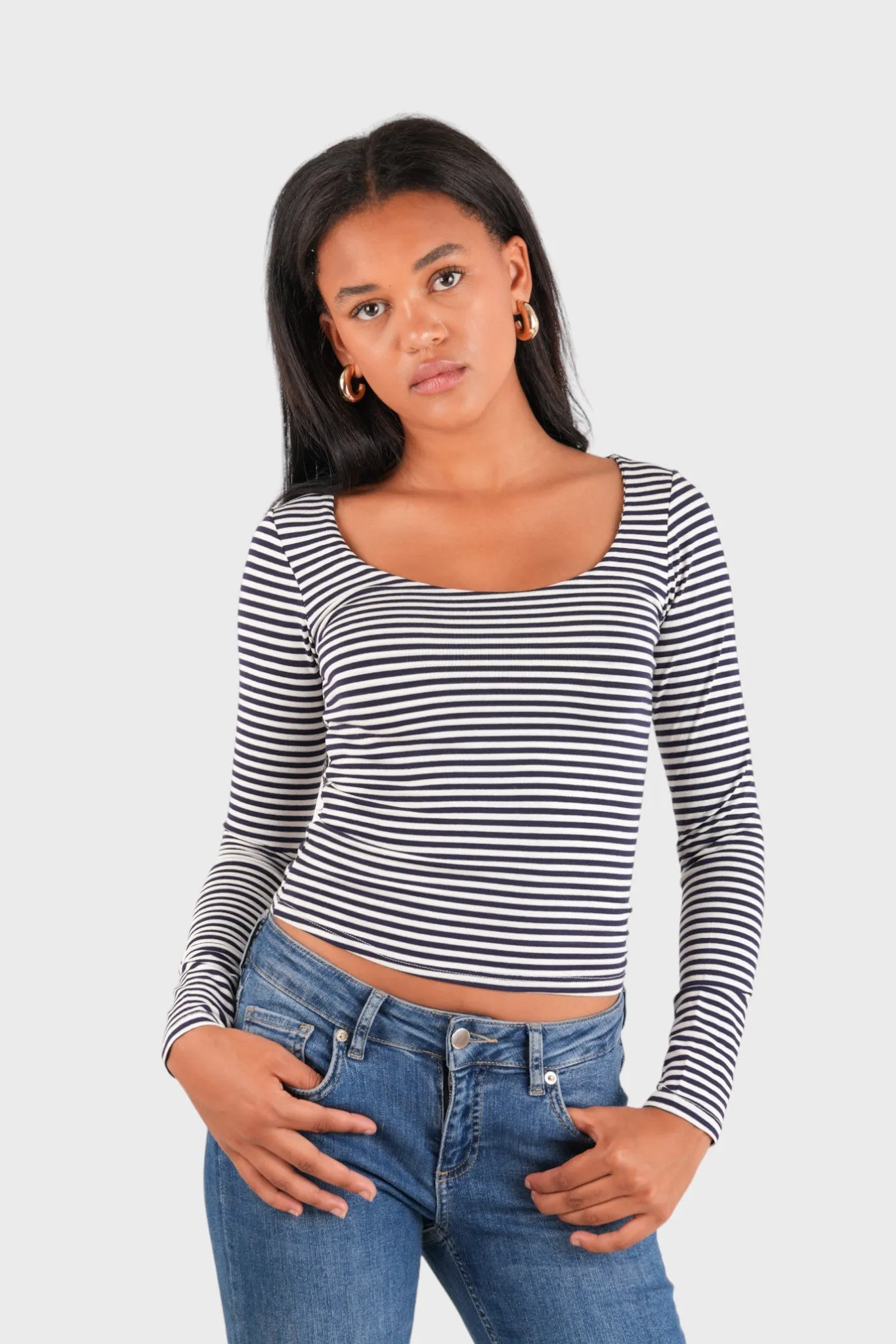"Nola" top striped navy sold by Meet Me There
