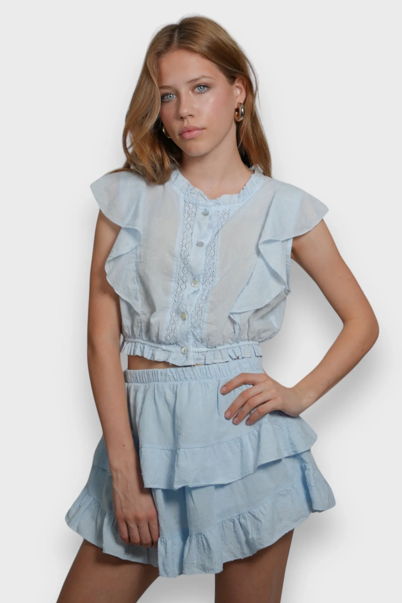 "Joy" skort light blue sold by Meet Me There