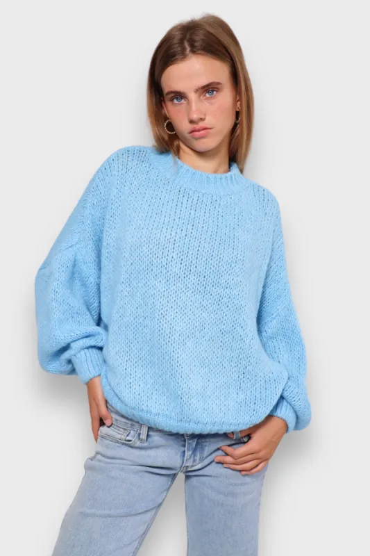 "Keep me warm" sweater blue sold by Meet Me There