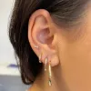 Pavé Diamond Drop Huggie Hoops sold by Adina Reyter