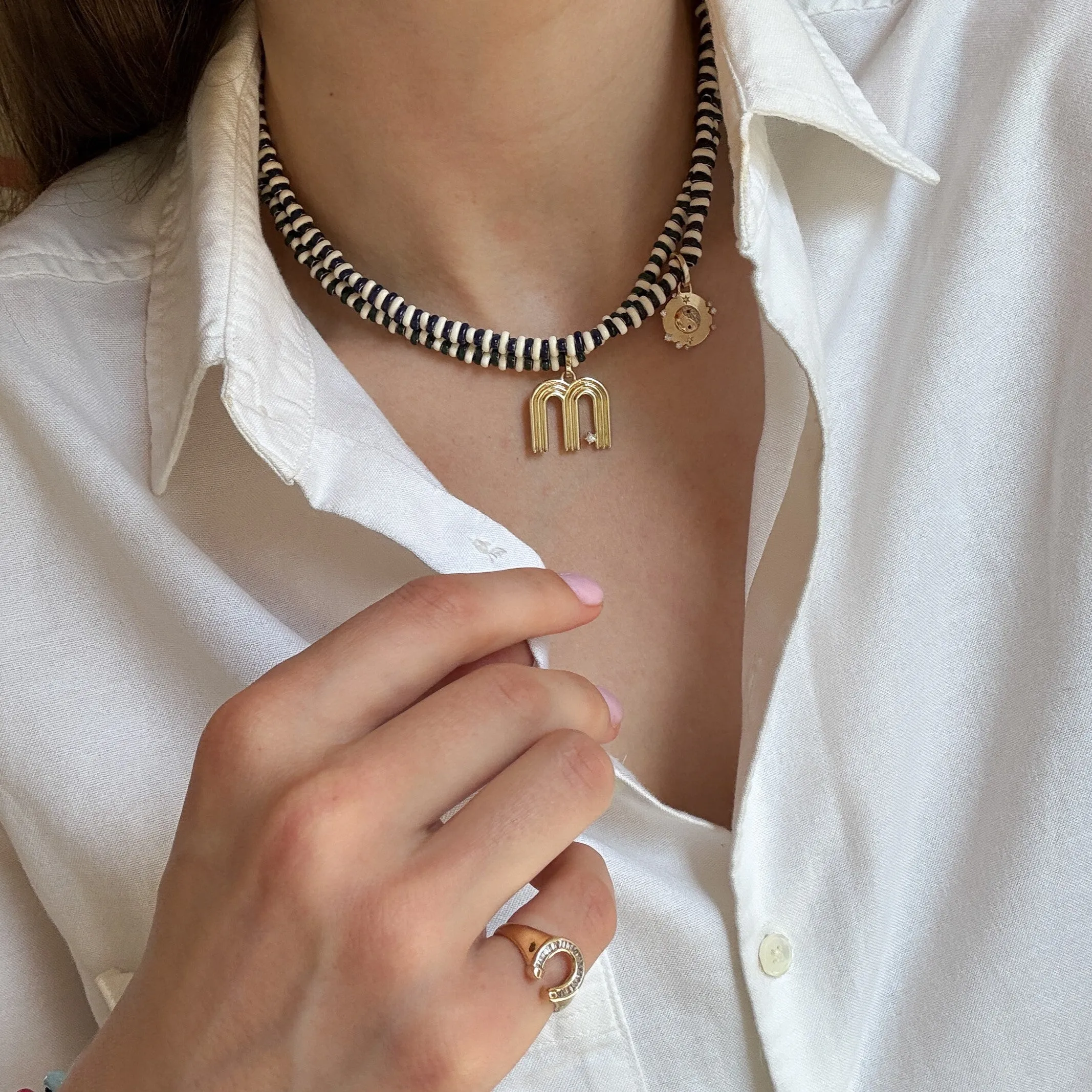 Charm Necklace 1 sold by Adina Reyter