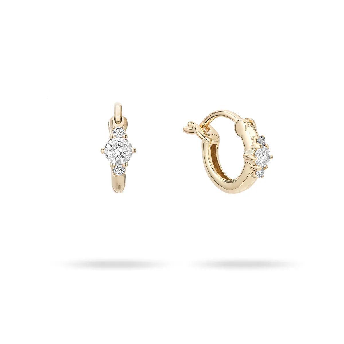 Diamond Trio Huggie Hoops sold by Adina Reyter