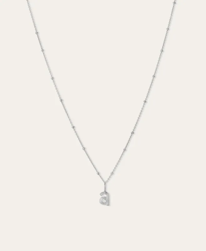 Groovy Initial Mini Charm Necklace on Saturn Chain in Sterling Silver sold by Adina Reyter