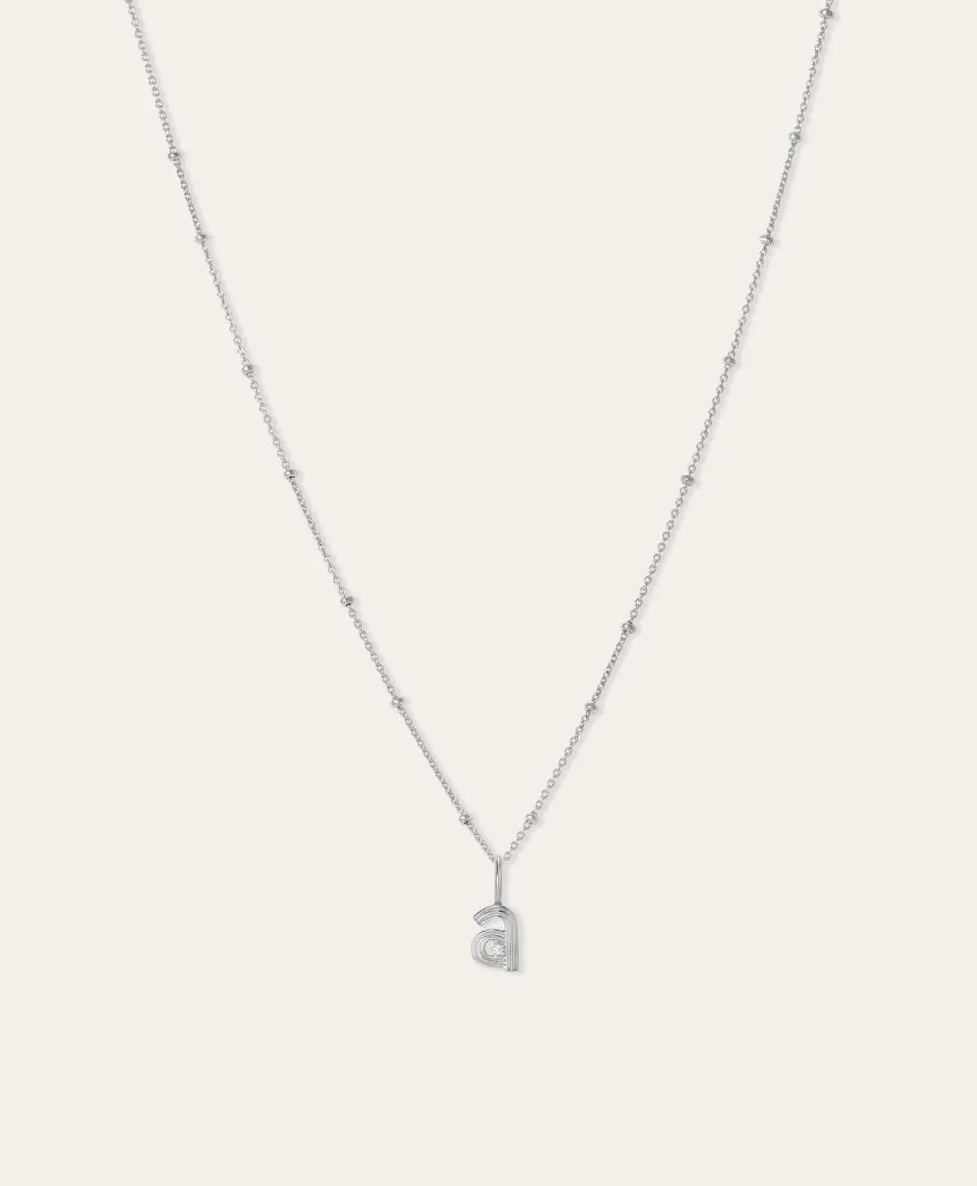 Groovy Initial Mini Charm Necklace on Saturn Chain in Sterling Silver sold by Adina Reyter